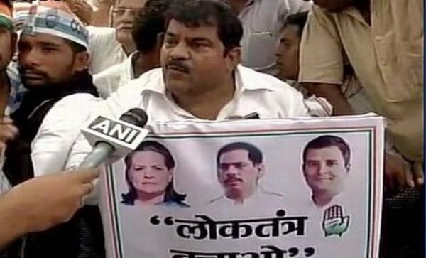 Vadra on Congress 'democracy march' posters, BJP calls it 'dynasty march'